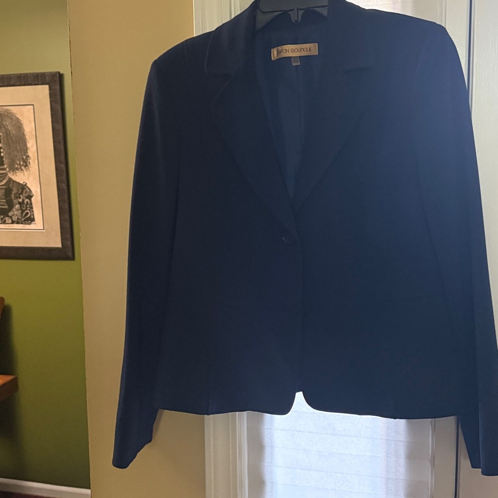 Women’s navy blue suit jacket in size 8